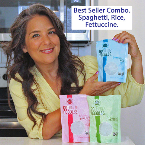Attractive woman in yellow blouse holds 3 varieties in GoSkinny Noodles Combo Packs: Rice, Spaghetti, and Fettuccine