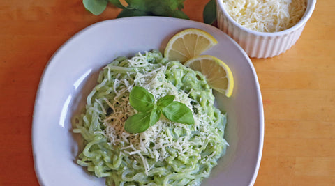 Creamy Avocado Pasta made with odorless, organic, keto GoSkinny Noodles Spaghetti konjac noodles (shirataki) on blue plate
